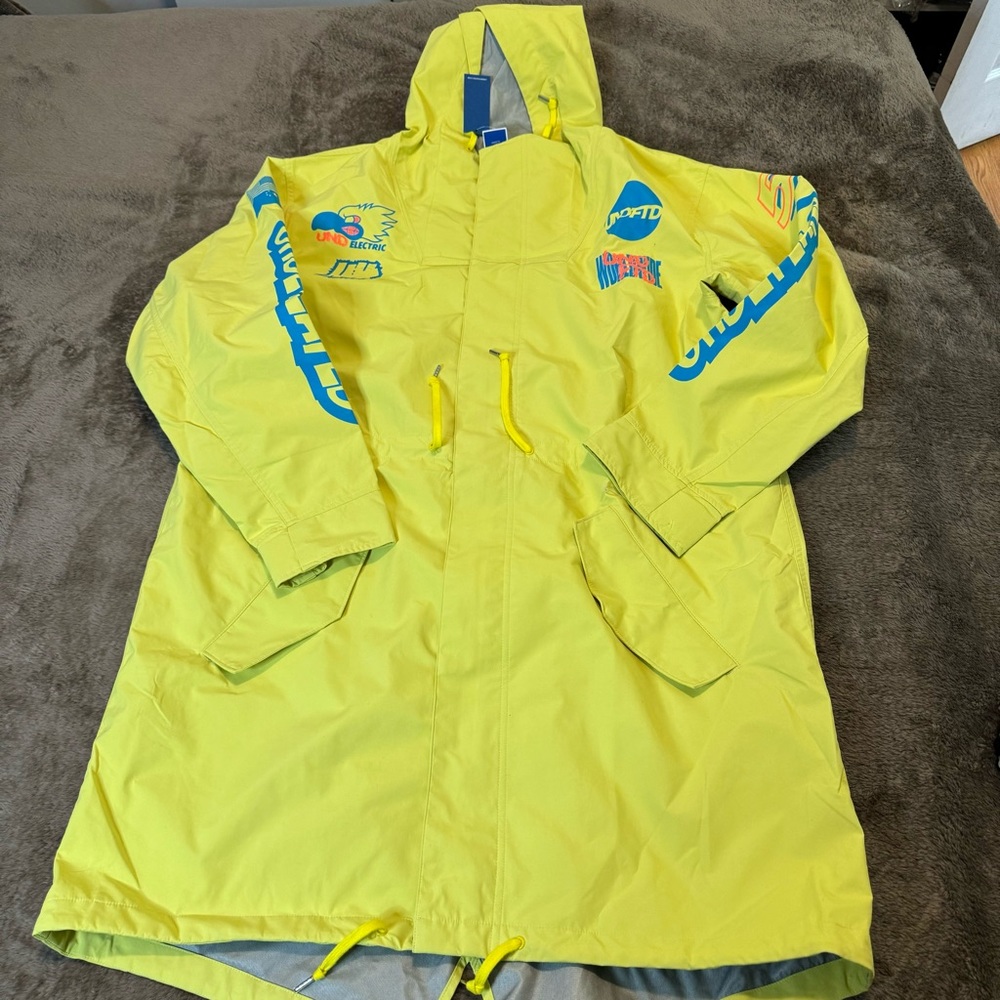 Undefeated rain coat sz l neon yellow brand new with tag